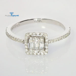 0.22 Carat Baguette Diamond Ring F-VS1 14 Karat