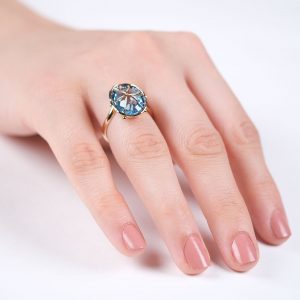 14 Karat Gold Solitaire Ring with Blue Topaz Oval Natural Stone